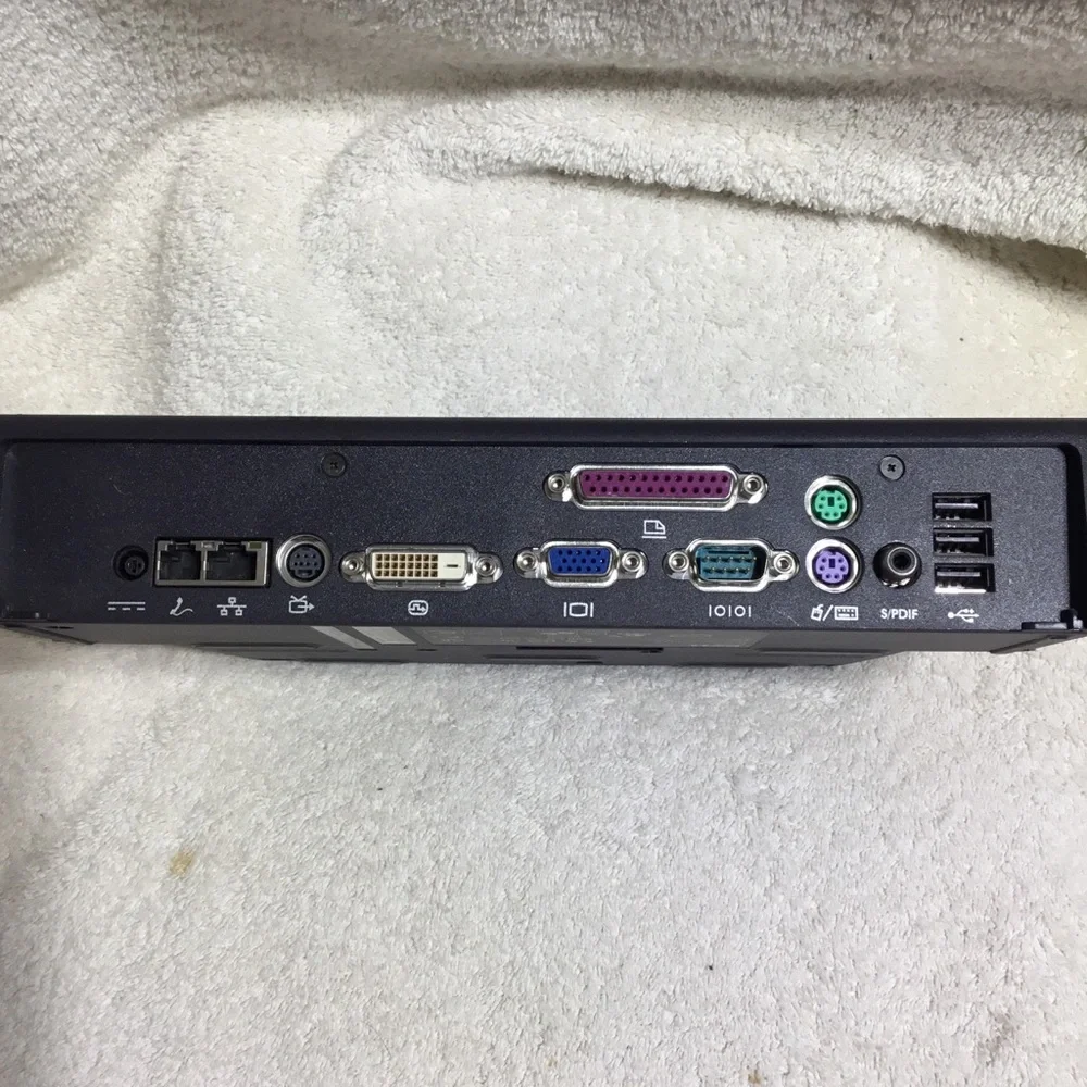 Dell Pro 1X laptop base station, charges and keeps attachments connected